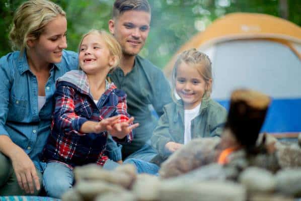 Happy Family on a summer camping trip